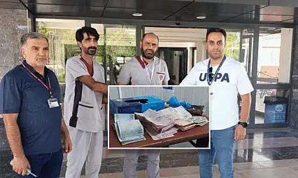 Temizlik personeli bulduğu poşet dolusu parayı polise teslim etti