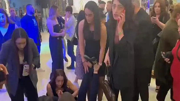 Depremde korkan kadın düğün salonunda bayıldı