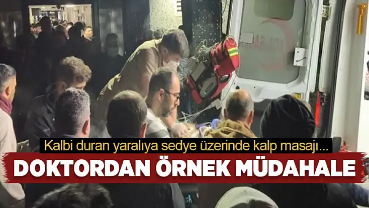 Doktordan örnek müdahale: Kalbi duran yaralıya sedye üzerinde kalp masajı