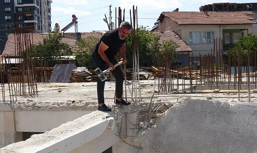 Kendi inşaatını ihbar eden müteahhit balyozla beton testi yaptı